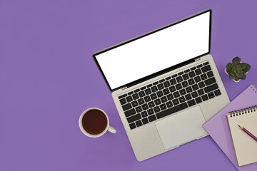 Poster - Top view with copy space and office desk on purple background, Empty screen of laptop, coffee cup and notebook.