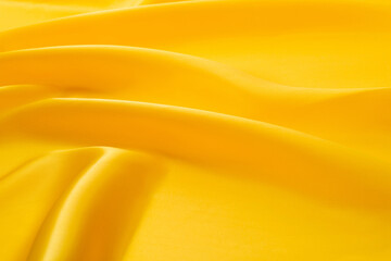 Close up of yellow silk background