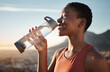 © C Malambo/peopleimages.com - Water, relax and black woman training in nature, happy hiking and fitness progress in Taiwan. Hydration, thirsty and African runner with a drink after sports exercise, running and morning workout