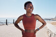 © C Malambo/peopleimages.com - black woman, happy and thinking on beach sidewalk for fitness motivation, mental health and runner rest outdoor. African woman, athlete smiling and confident mindset vision by Cape Town seaside