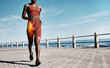 © C Malambo/peopleimages.com - Running, x ray and body of an black woman training, fitness muscle and exercise for health on the promenade in Australia. Sports burn, strong and legs of an African athlete at the sea for cardio