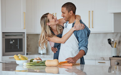 Wall Mural - Cooking, love or couple hug in a kitchen with healthy food diet in an interracial relationship or marriage at home. Carrot, vegetables or happy woman hugging romantic partner preparing a dinner meal