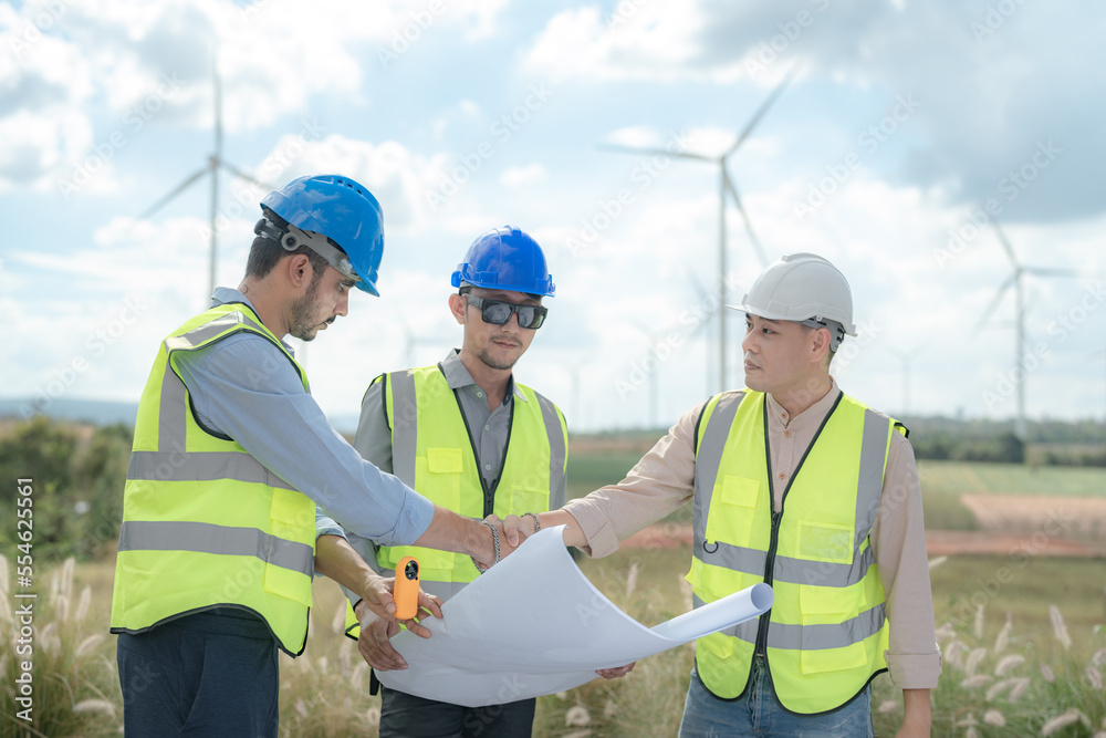Asian engineer working in fieldwork outdoor. Workers check and inspect ...