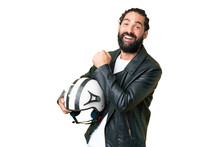 Young Man With Beard With A Motorcycle Helmet Over Isolated Chroma Key Background Celebrating A Victory