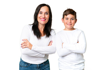 Wall Mural - Little caucasian kid over isolated chroma key background keeping the arms crossed