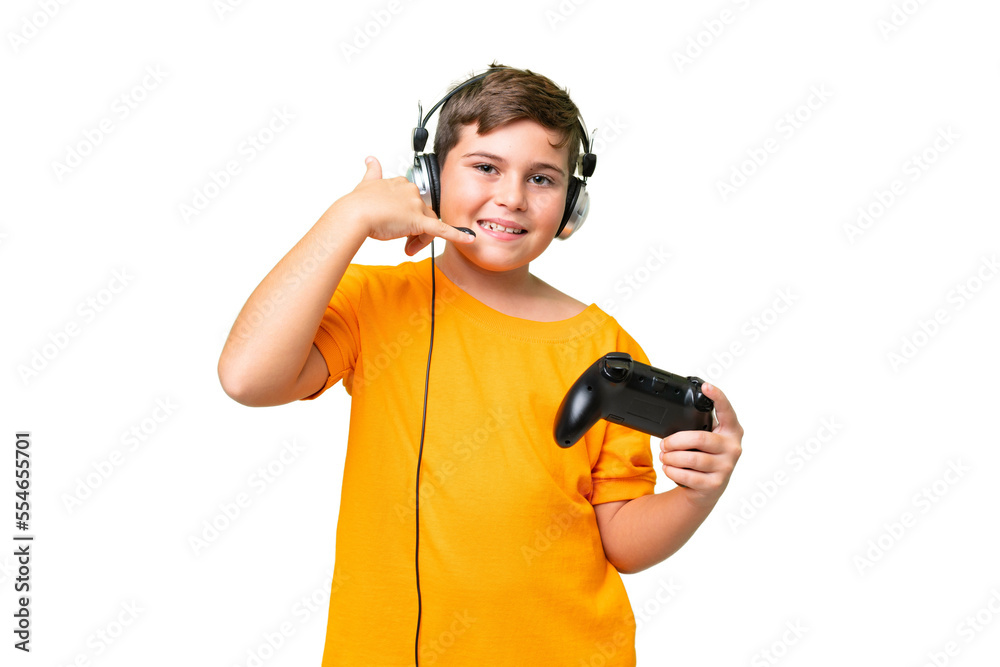Kid With Controller Little caucasian kid playing with a video game controller over isolated ...