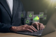© Supatman - Reduce CO2 emission concept. Businessman using laptop for working technology Net zero and Carbon neutrality, green business and development based on renewable energy. Global Warming, carbon footprint,