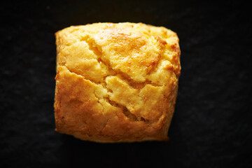 Wall Mural - Plain scones on a black background