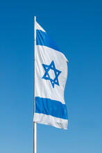 Israeli Flag With Blue Sky Background