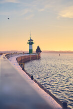 Lighthouse At Travemunde At The Baltic Sea In Winter. High Quality Photo
