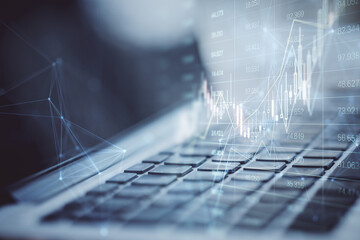Aufkleber - Close up of laptop computer with glowing forex index chart/graph on blurry background. Trade, finance and market concept. Double exposure.
