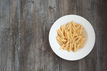 Canvas Print - A bowl of penne pasta