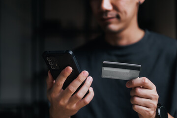 Man paying and shopping with smartphone application. Digital money transfer, banking and e commerce concept. Mobile payment with wallet app technology.