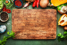 Food Background. Rustic Wooden Cutting Board. Vegetables, Mushrooms, Roots, Spices - Ingredients For Vegan, Cooking. Healthy Eating, Diet, Comfort Slow Food. Concept. Old Kitchen Table, Top View