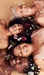 © David L/peopleimages.com - Top view, women diversity or faces with flowers on studio background in empowerment, divine feminine energy or self love. Smile, happy or skincare beauty models with plants, leaf or organic spa glow