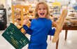 © Volodymyr - Kid choosing food in grocery store or a supermarket. Fruit and vegetable.