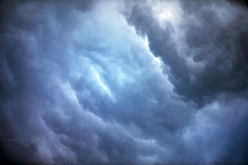 Wall Mural - dramatic dark blue sky with heavy clouds background