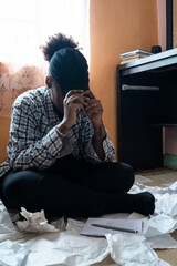 frustrated woman sitting on the floor