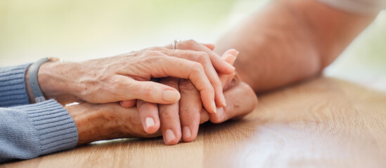 Canvas Print - Senior, holding hands and support with couple, comfort and help on table for grief, pain or sympathy. Elderly man, old woman and helping hand for empathy, love and care in home with bonding together