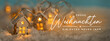 Christmas Greeting Card, German text. Abstract Christmas Winter Panorama with Wooden Houses Christmas String Lights in Cold Snow Landscape and Glowing Golden Lights in Background. Panorama, Banner. 