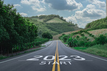 Happy New Year 2023,2023 Symbolizes The Start Of The New Year. The Letter Start New Year 2023 On The Road In The Nature Route Roadway Have Tree Environment Ecology Or Greenery Wallpaper Concept.