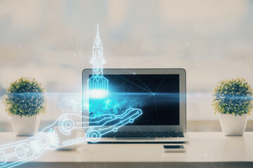 Poster - Desktop computer background in office and start up theme hologram drawing. Double exposure. Startup concept.