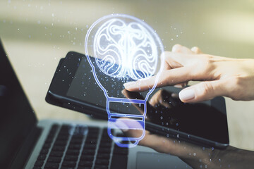 Poster - Creative light bulb illustration with human brain and with finger presses on a digital tablet on background, future technology concept. Multiexposure