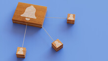 Alert Technology Concept With Bell Symbol On A Wooden Block. User Network Connections Are Represented With White String. Blue Background. 3D Render.