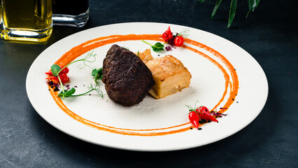 Wall Mural - Fried beef fillet steak with sauce and microgreens.