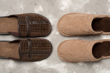 Wall Mural - Man's slippers on wooden background, top view