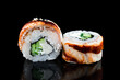 Japanese cuisine maki sushi rolls with smoked eel, cream cheese and cucumber.