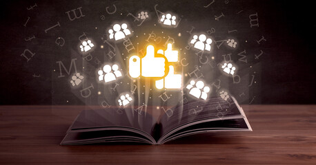 Open book with social networking icons above