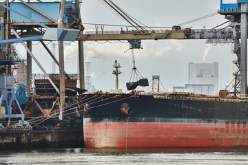 Wall Mural - Unloading a huge ship