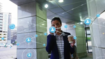 Poster - Animation of network of connections with icons over businessman wearing vr headsets