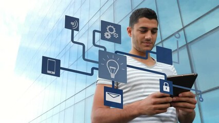 Poster - A male executive using a digital tablet in office premises
