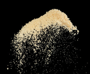 Wall Mural - Brown Sugar flying explosion, brown grain sugar explode abstract cloud fly. Beautiful complete seed sugarcane splash in air, food object design. Selective focus freeze shot Black background isolated