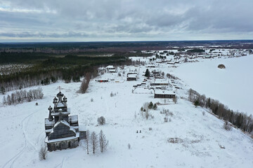 Wall Mural - wooden church winter top view, landscape russian north architecture