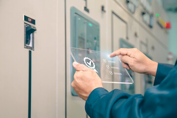 Wall Mural - Engineer inspecting high voltage control equipment, maintenance concept