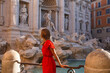 Tourist at Trevi Fountain in Rome Italy Fontana di Trevi Roma