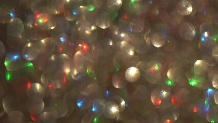 Wall Mural - Natural Bokeh Light Leaks effect. Light bokeh circles with multicolor moving lights. Lens Flare shimmery highlights. Abstract 4K moving background. 