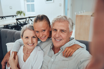 Canvas Print - Family, love and selfie on sofa in home, having fun and bonding. Hug, portrait and grandpa, grandmother and girl taking pictures for profile picture, social media and happy memory together in house