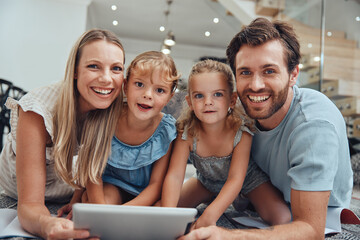 Wall Mural - Kids, portrait and family with tablet on home floor for bonding, relaxation and streaming. Happy, mother and dad with children in house enjoying online movie together on weekend in Canada.