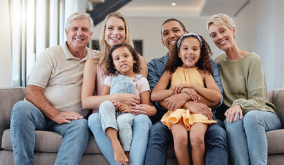 Wall Mural - Big family, portrait and relax on sofa in living room, smiling or bonding. Love, diversity or care of grandparents, father and mother with girls on couch, having fun or enjoying quality time together