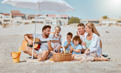 Canvas Print - Beach picnic, guitar and big family on holiday for travel, relax and music entertainment in Portugal. Happy, enjoyment and cheerful man with instrument for children, mother and senior parents