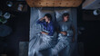 © Gorodenkoff - Top View Apartment: Happy Young Couple Sleeping in Bed at Night. Beautiful Girlfriend and Handsome Boyfriend Sleeping Together. Family of two Sweetly Calmly in a Double Bed. Top Down