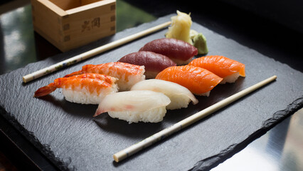 Wall Mural - Set of sushi with variety of nigiris with fine fish like salmon and tuna.