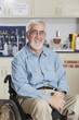 © Designpics - Portrait of an engineering professor in a wheelchair with Muscular Dystrophy in a chemistry lab