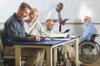 © Designpics - Faculty meeting in an engineering school, one professor with a spinal cord injury and one with Muscular Dystrophy