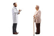 © Ljupco Smokovski - Full length profile shot of a doctor writing a document and standing with an elderly female patient