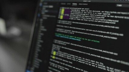 Closeup coding on screen, Man hands coding html and programming on screen laptop, development web, developer.
